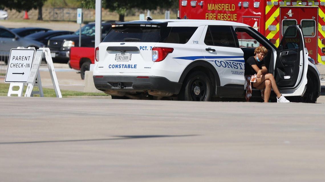 Parents were instructed to wait in a designated area near Timberview High School in Arlington Wednesday after an active shooting incident at the school. Mansfield ISD said the situation was under control. Multiple people were injured.