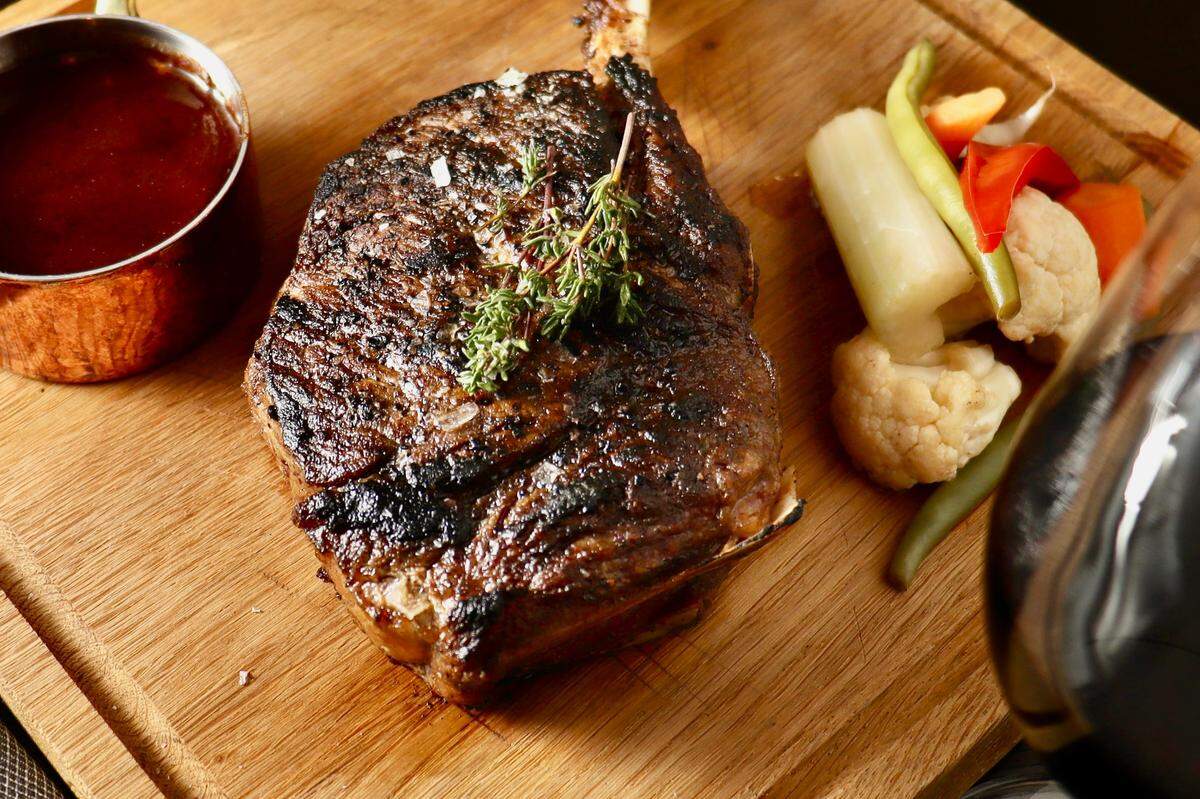 A spiced, coffee-rubbed Akaushi beef steak with a red-wine glaze leads the Father’s Day menu at Cut & Bourbon in Arlington.