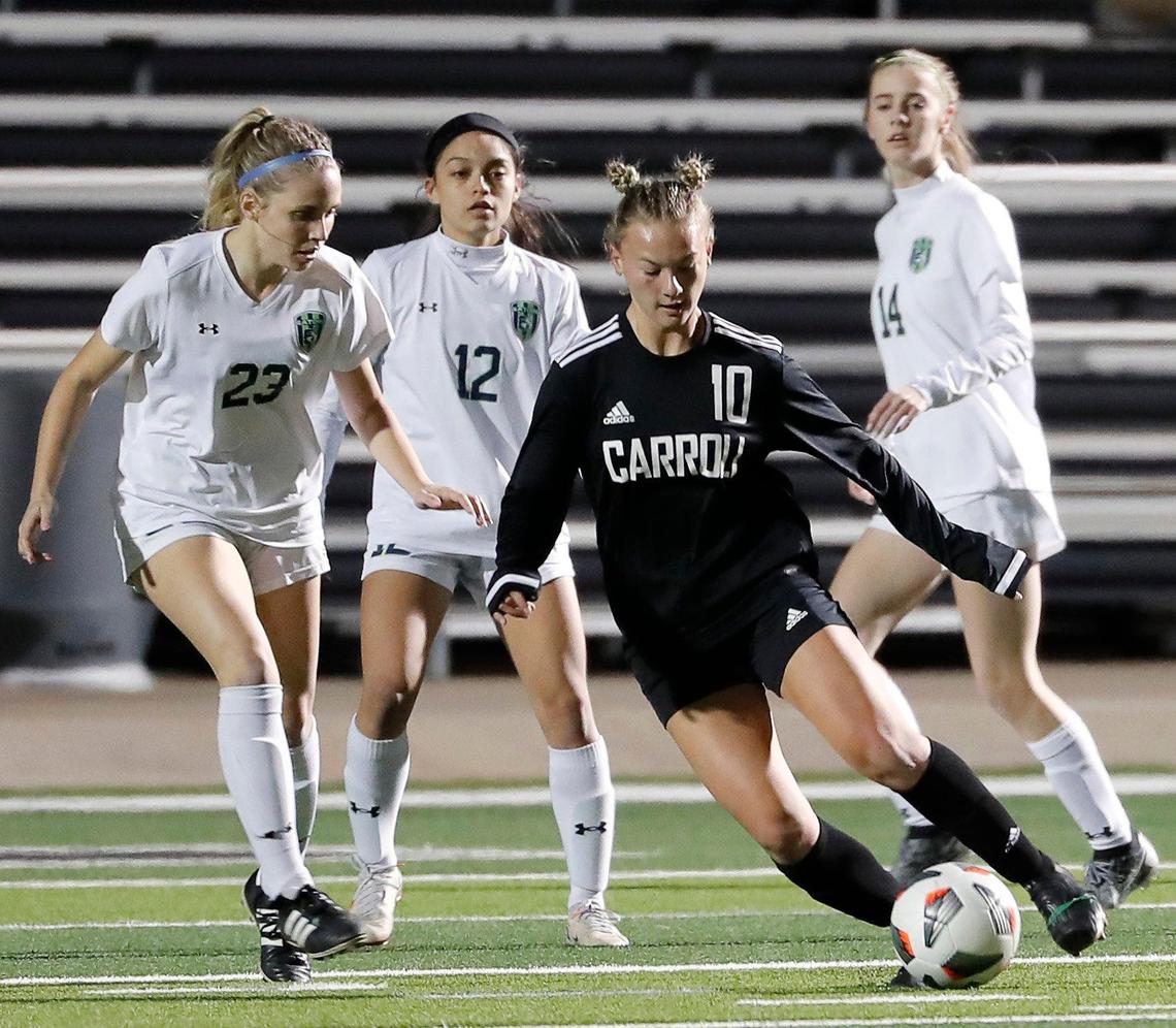 Carroll’s Kennedy Fuller takes the ball in front of Eaton’s defense during a high school girls soccer game at Dragon Stadium in Southlake, Texas, Wednesday, Feb. 09, 2022. Carroll defeated Eaton 8-1. (Special to the Star-Telegram Bob Booth)