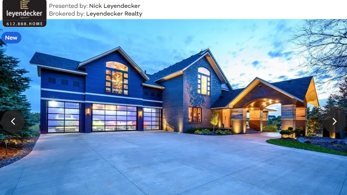 The classy exterior of the home pairs oddly well with its deep purple paint.