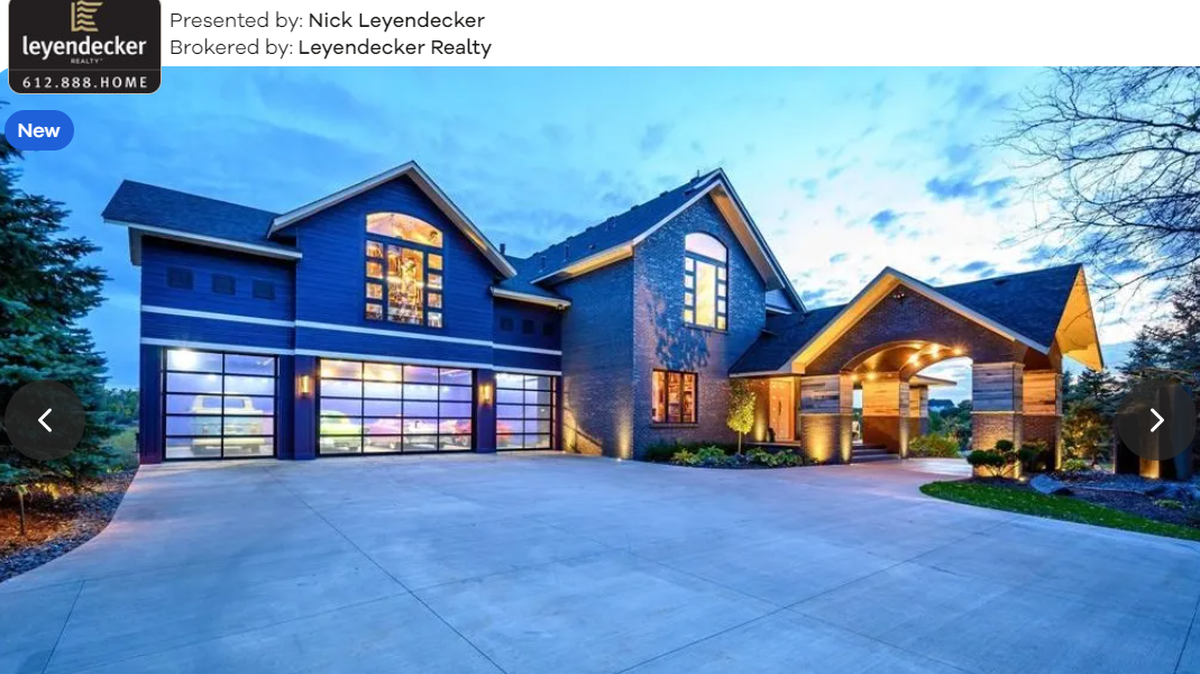 The classy exterior of the home pairs oddly well with its deep purple paint.