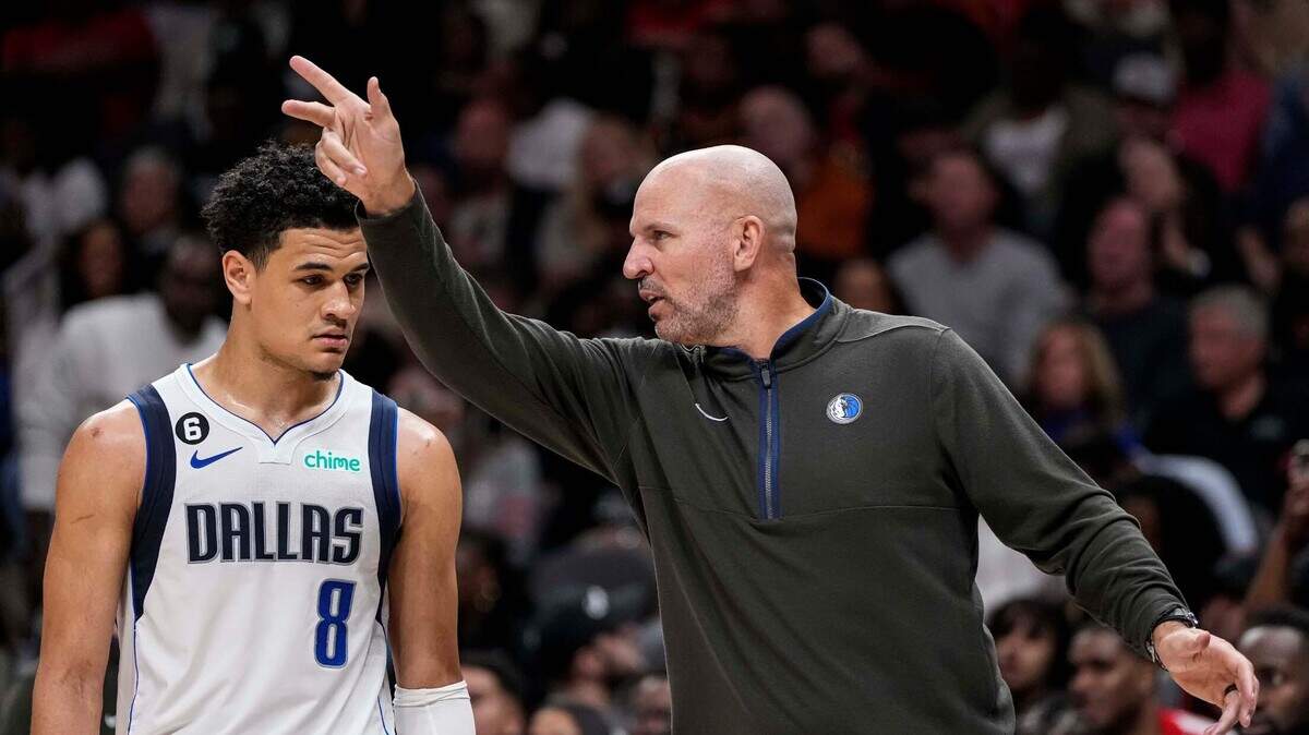 Dallas Mavericks head coach Jason Kidd instructs guard Josh Green (8) against the Atlanta Hawks on Sunday.