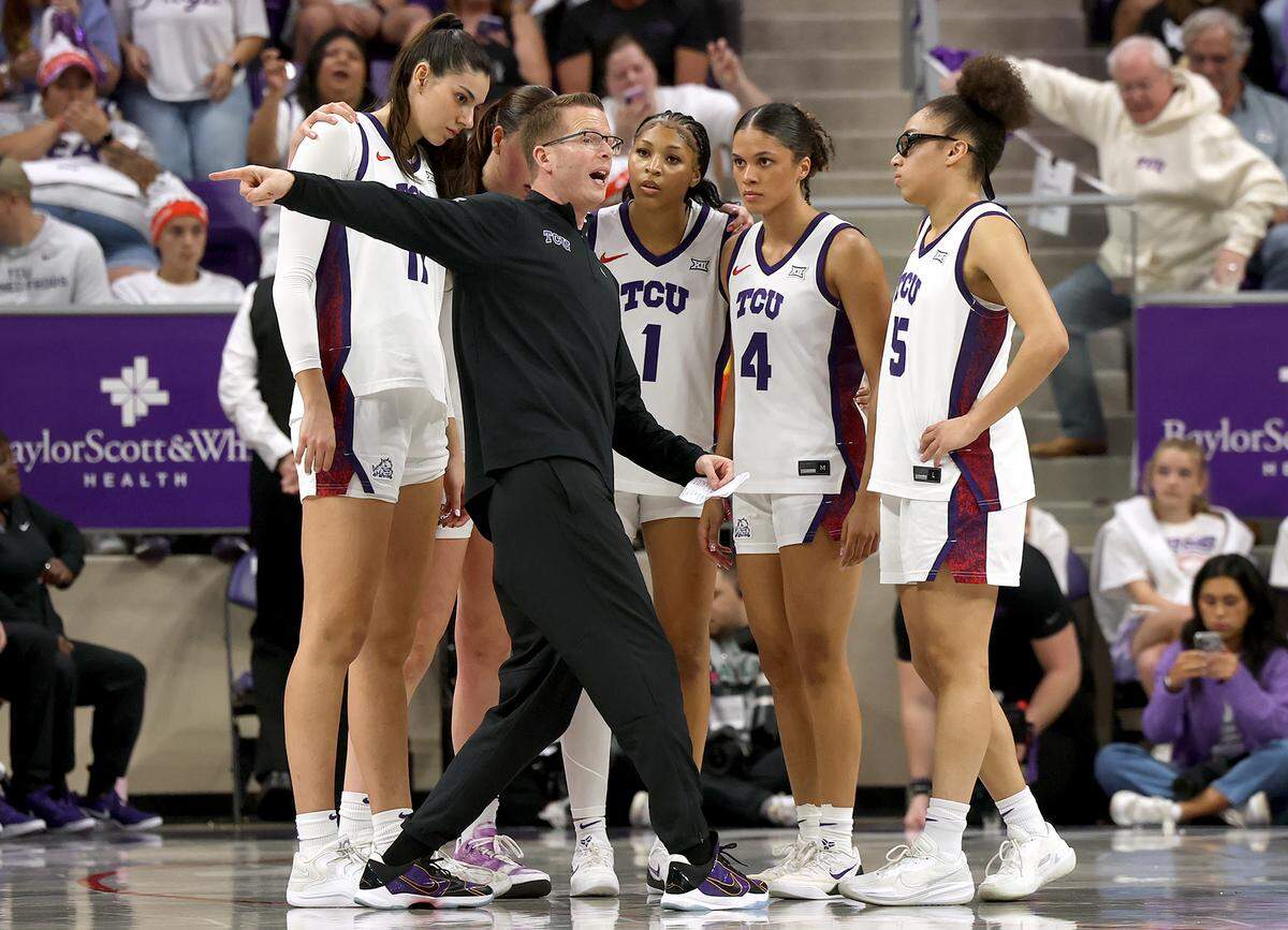 TCU head coach Mark Campbell talks to his team during the regular-season finale against Baylor on March 1 at Schollmaier Arena in Fort Worth. The Horned Frogs won 65-53 to claim the outright Big 12 title.
