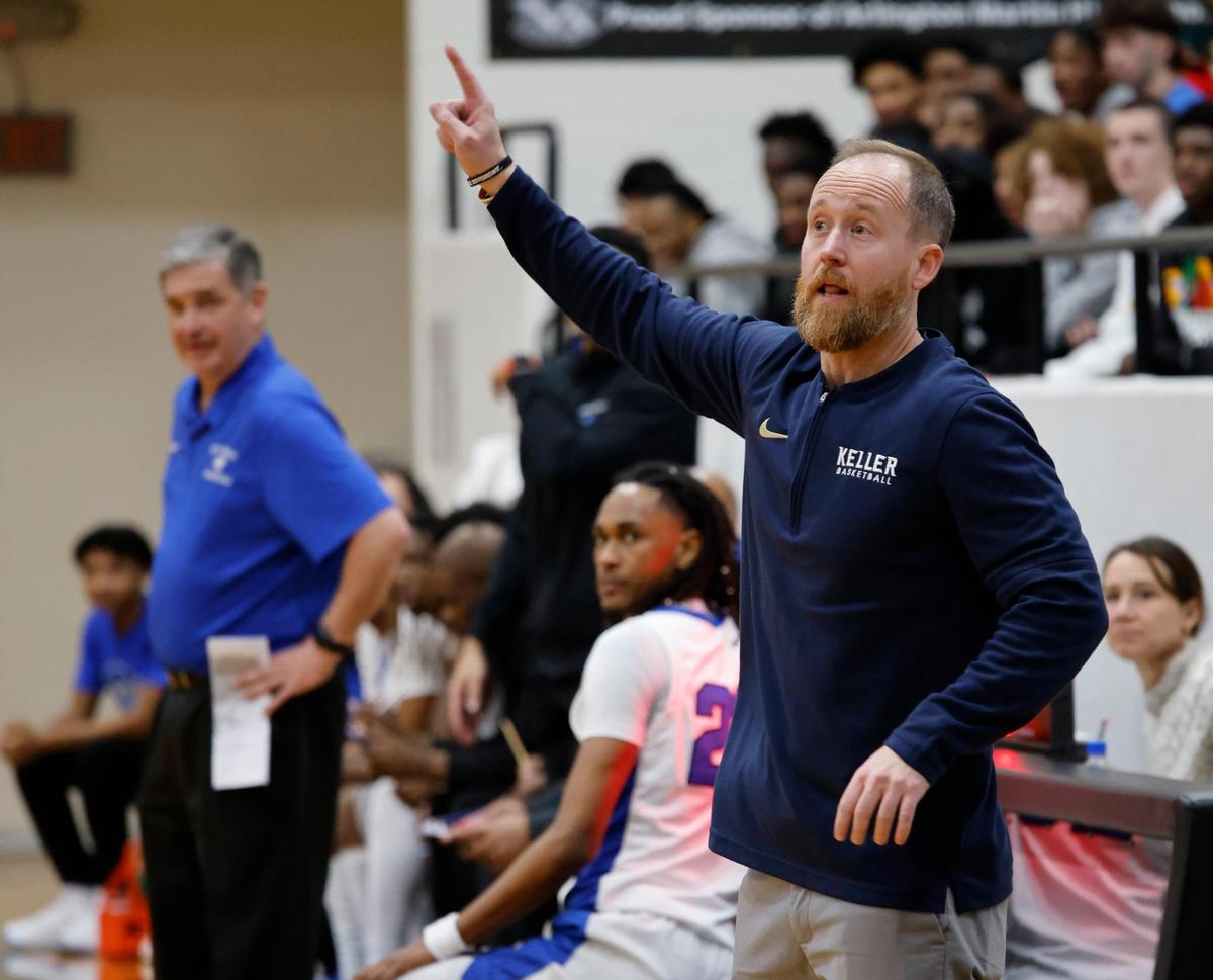 Keller head coach Zach Weir signals in a play during the second half of the UIL 6A Region I Bi-District playoff game at Martin High School in Arlington, Texas, Monday, Feb. 17, 2025.