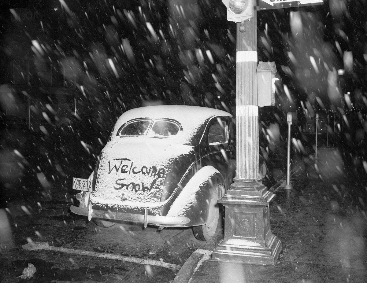 Dec. 28, 1942: “One person’s manner of greeting the snow in Fort Worth early Monday; ‘Welcome snow’ is written in the snow on the trunk of a car parked at 7th and Throckmorton, next to a stoplight. The license plate is K46-272 Texas - 42. Published Monday, Dec. 28, 1942 in the evening edition of the Fort Worth Star-Telegram.”