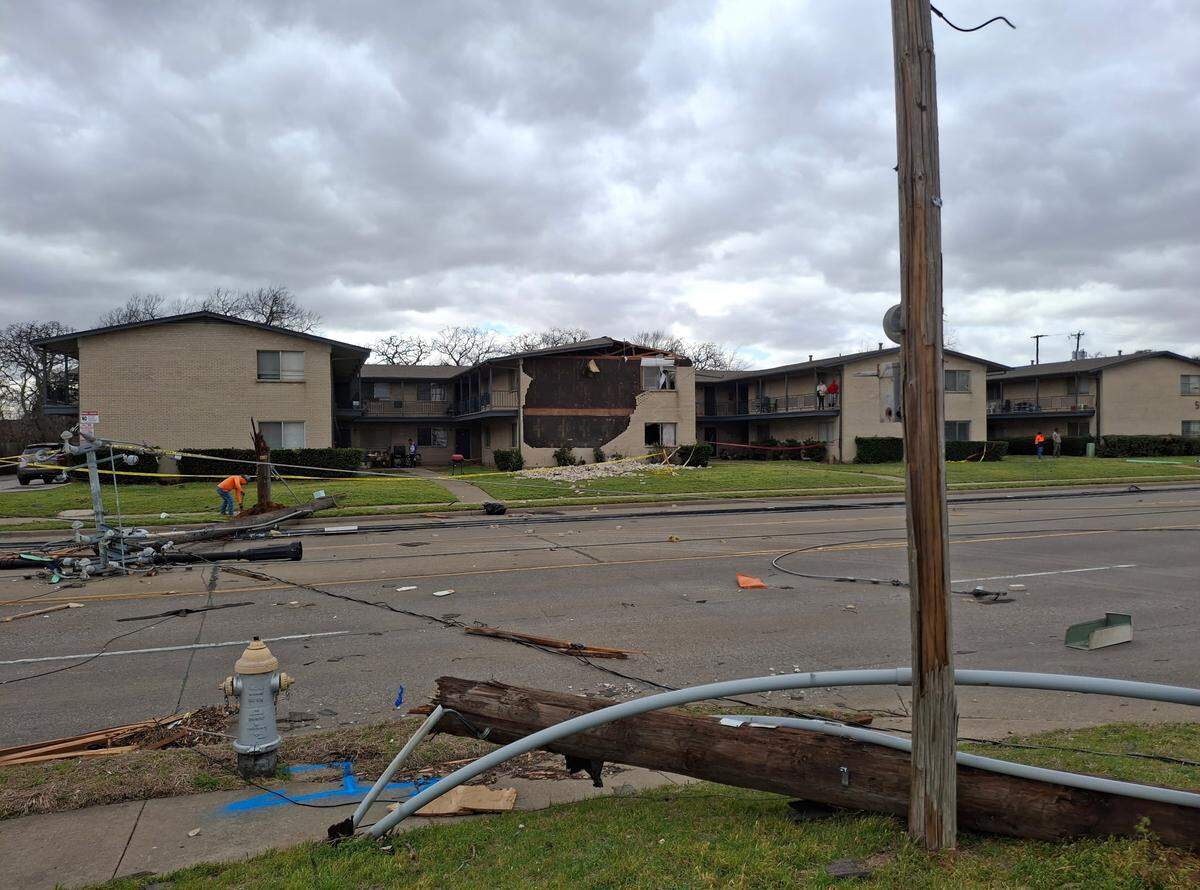 A tornado on Tuesday, March 4, ripped part of the roof and the facade from at least one building at Las Haciendas Apartments in Irving.