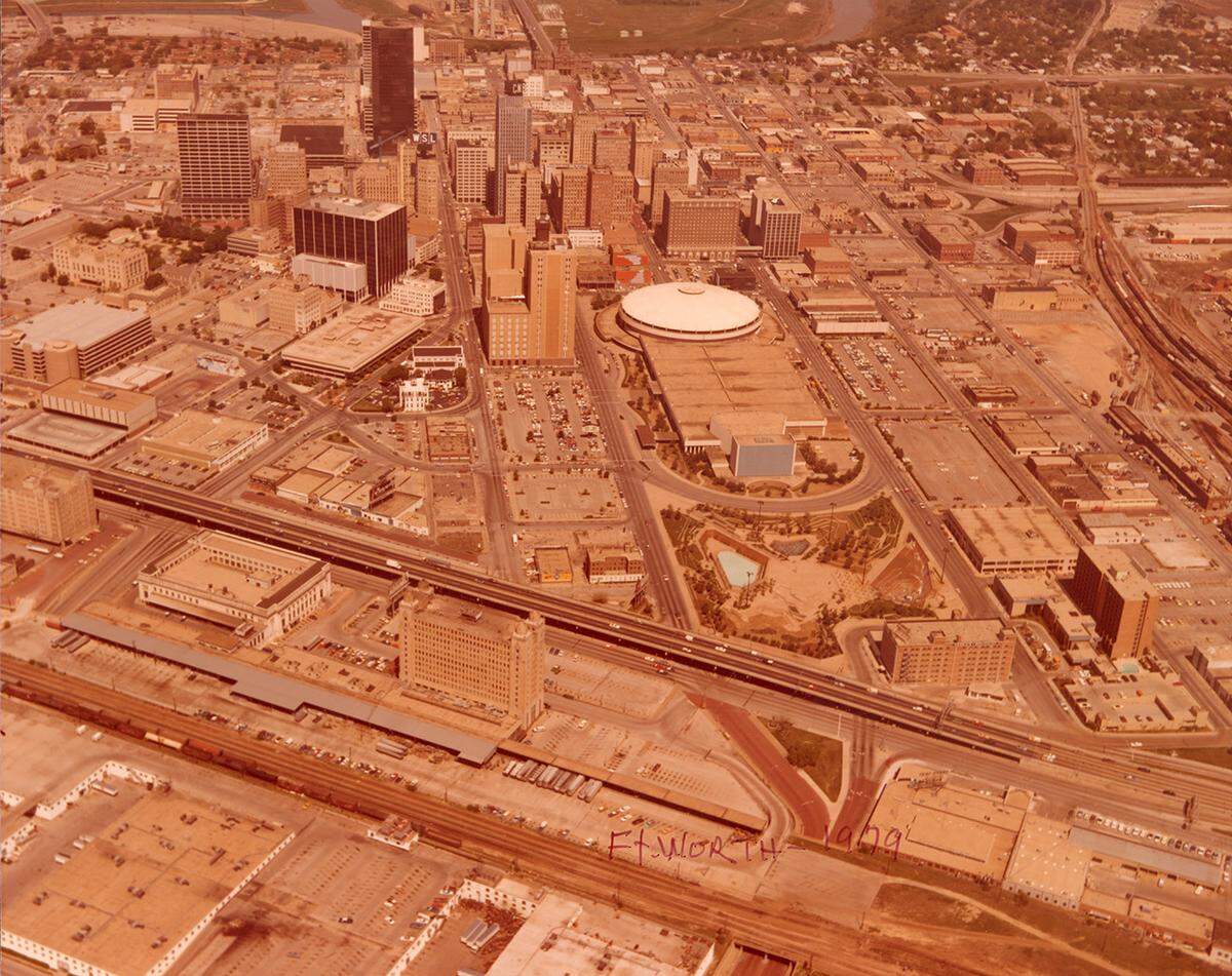 An aerial view of Tarrant County Convention Center and downtown Fort Worth looking northeast in the late 1970s.