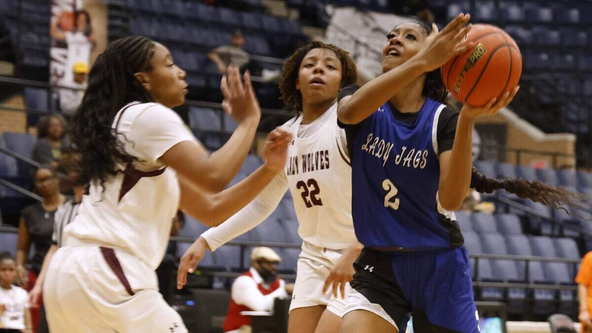 Mansfield Summit guard Aryn Williamson (2) gets a shot off against Mansfield Timberview during the first half of a UIL girls basketball game at Mansfield Timberview High School in Arlington, Texas, Tuesday Feb. 10, 2026.