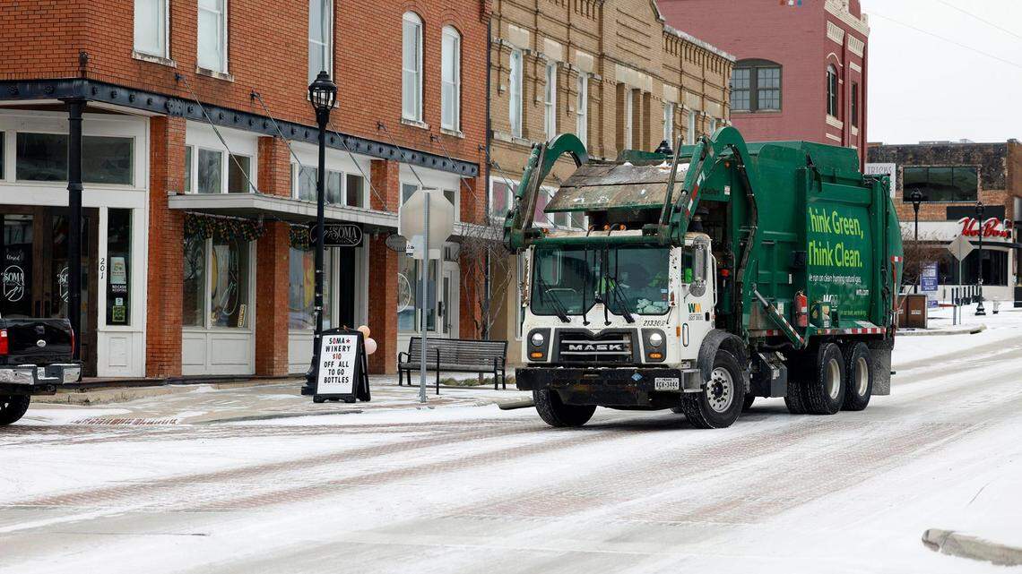 A Waste Management truck drives along South Main Street on Monday, January 15, 2024.