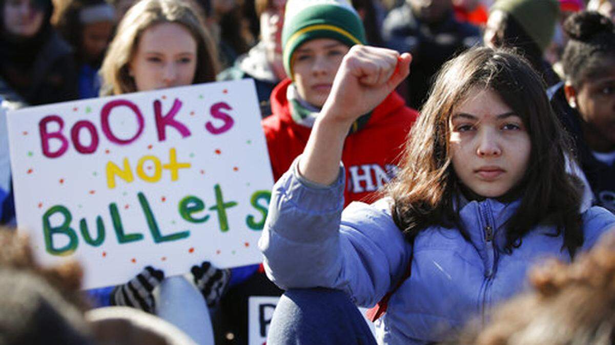 This March 14, 2018 file photo shows students sitting in silence as they rally in front of the White House in Washington. Students walked out of school to protest gun violence in the biggest demonstration yet of the student activism that has emerged in response to February's massacre of 17 people at Florida's Marjory Stoneman Douglas High School.