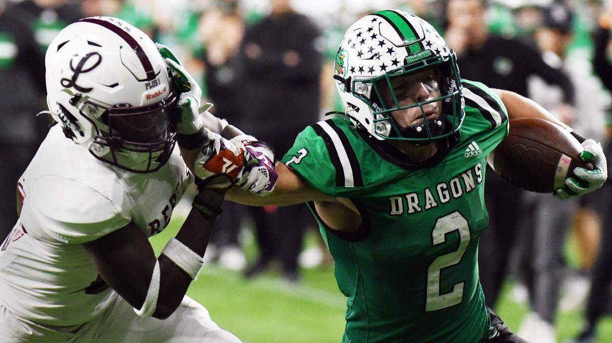 Southlake Carroll’s Owen Allen (right) is nearing 100 touchdowns for his career. Special/Bob Haynes