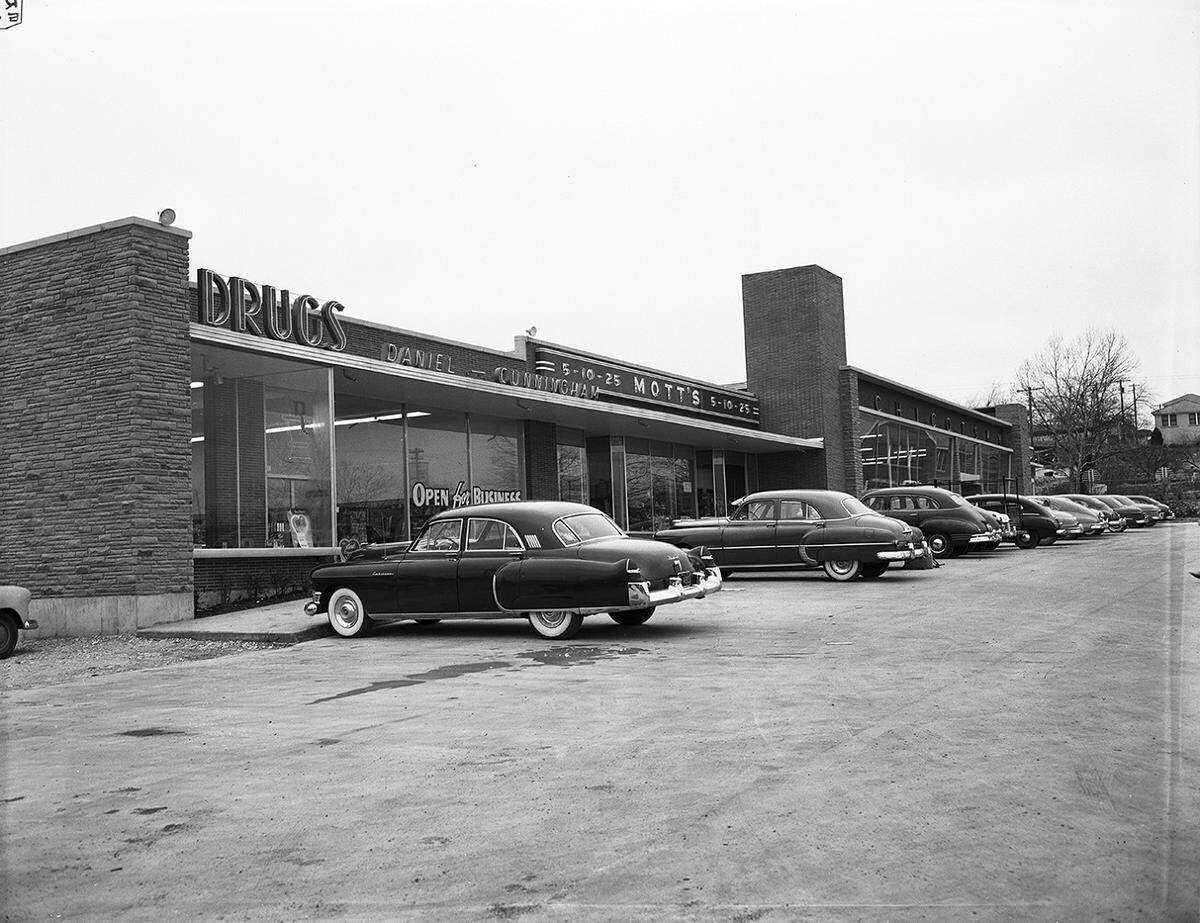 Feb. 13, 1951: The Chicotsky Shopping Center in the 3400 block of West 7th Street. This is a view of the northeast corner of the building. It shows the front of the Daniel Cunningham Drugs and Motts Variety Store. In the background is Chicosky’s Super Market Number 2 and Chicosky’s Liquor Store. (The location today is the strip center that includes Milano’s Ristorante.)