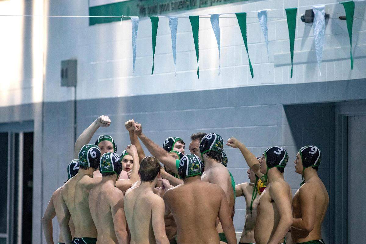 The Southlake Carroll Dragons boys water polo team won a co district title this season.