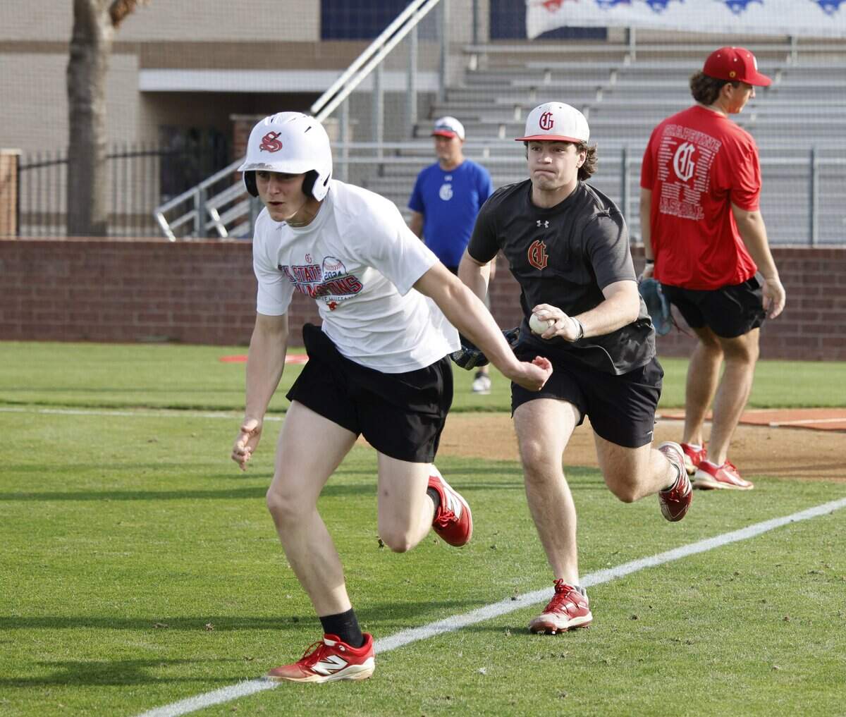 Mustang infielder Jackson Fry runs down pitcher Reid Windom during situational drills during Grapevine Mustang baseball practice at Grapevine High School in Grapevine, Texas, Tuesday Feb. 17, 2026.