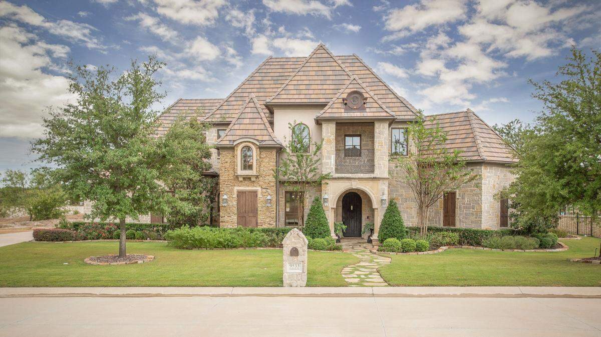 The chateau-style home at 9533 Marbella Drive boasts exquisite details throughout.