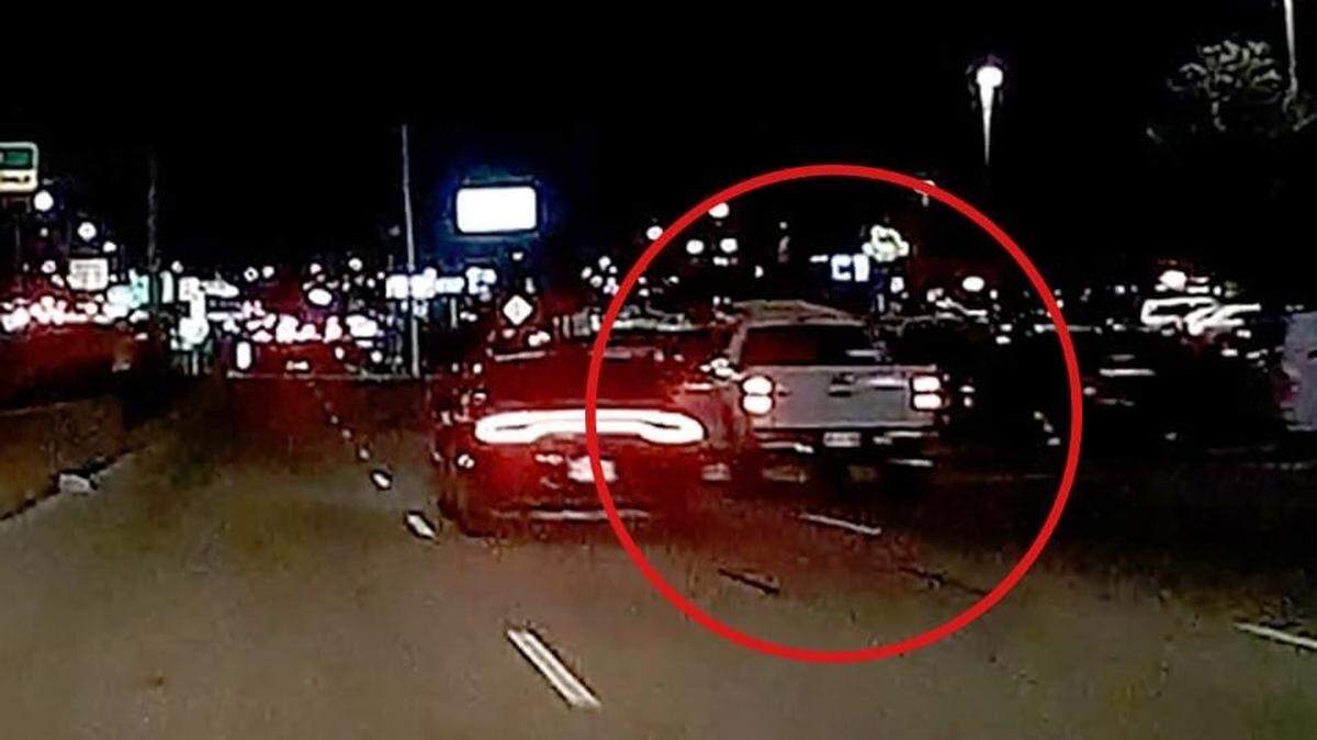 Police in Bedford are looking for the person who was driving this truck in Bedford on Tuesday evening when the driver of the black Charger, next to the truck, hit a car and killed an 84-year-old man while the two pictured vehicles were racing.