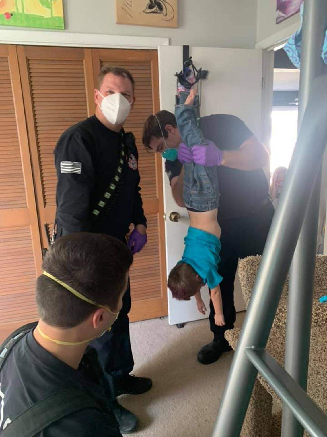 Fire fighters finally free the trapped child.