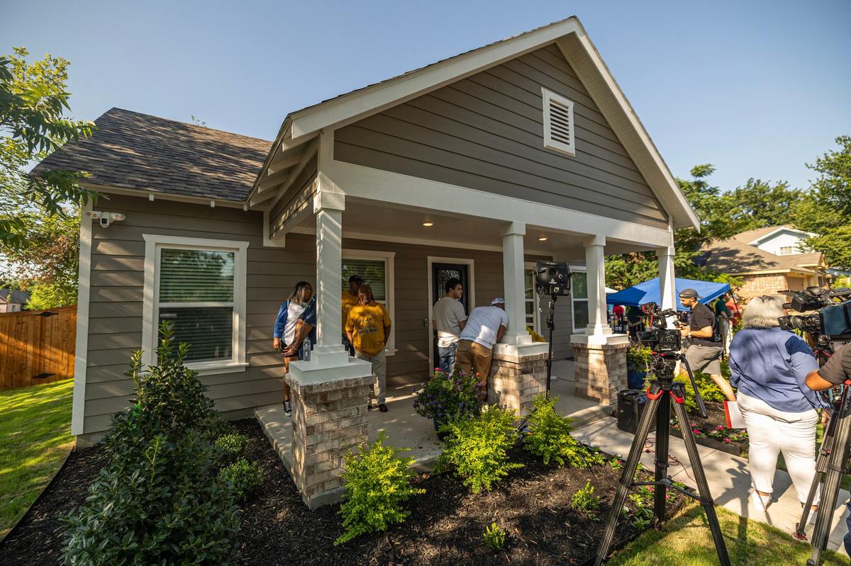 Media gather at the new house for Opal Lee on Friday.
