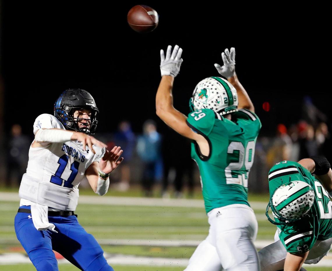 Byron Nelson quarterback Jake Wilson (11) drops a pass over the head of Southlake Carroll linebacker Nigel Fodor (29) in the second half of a District 4-6A football game at Dragon Stadium in Southlake, Texas, Friday, Oct. 28, 2022. Carroll defeated Byron Nelson 38-23. (Special to the Star-Telegram Bob Booth)
