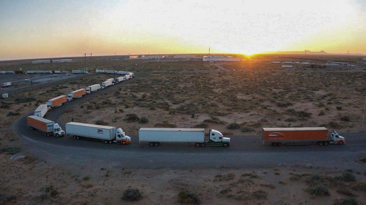 Truckers block the entrance into the Santa Teresa Port of Entry in Ciudad Juarez going into New Mexico on April 12, 2022. The truckers blocked the port as a protest to the prolonged processing times implemented by Gov. Abbott, which they say increased from 2-3 hours up to 14 hours over a few days.