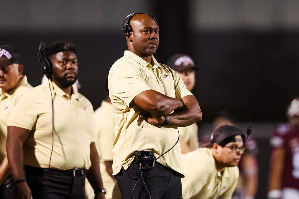 Keller Central head coach Eric Vance stares toward his team while driving during a district game between Keller Central and L.D. Bell at Keller ISD Stadium in Keller, Texas on October 16, 2025.