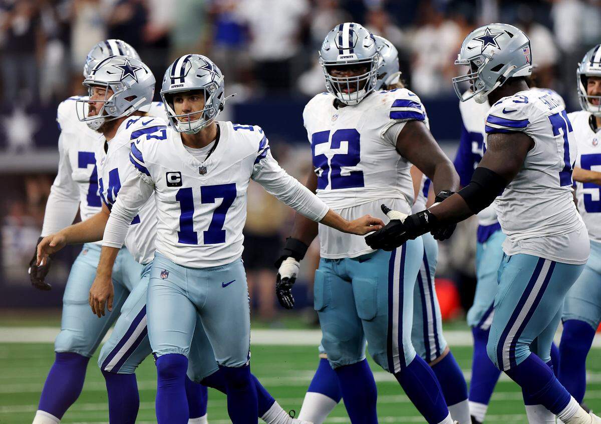 Teammates celebrate with Dallas Cowboys kicker Brandon Aubrey after he scored a 64-yard field goal against the New York Giants to send the game into overtime on Sunday, Sept. 14, 2025, at AT&T Stadium in Arlington.