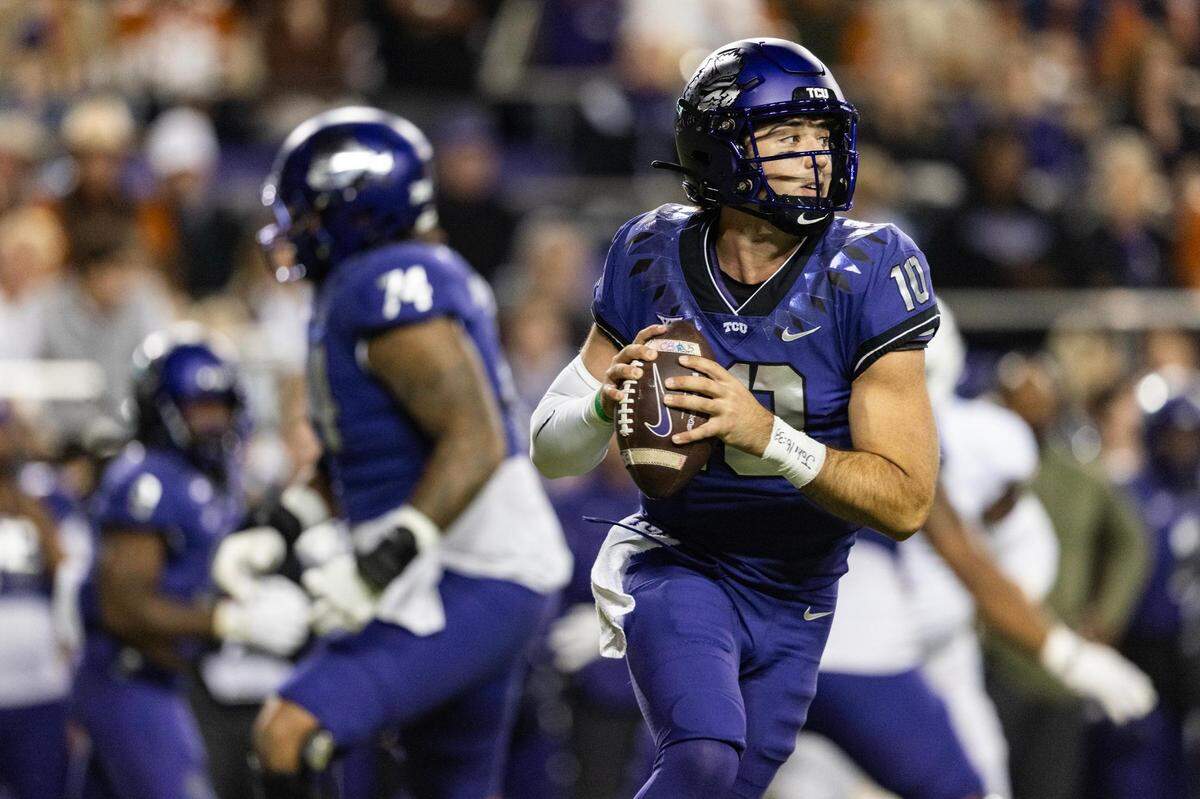TCU quarterback Josh Hoover (10) prepares to throw a pass against the Texas Longhorns at Amon G Carter Stadium in Fort Worth on Nov. 11, 2023.
