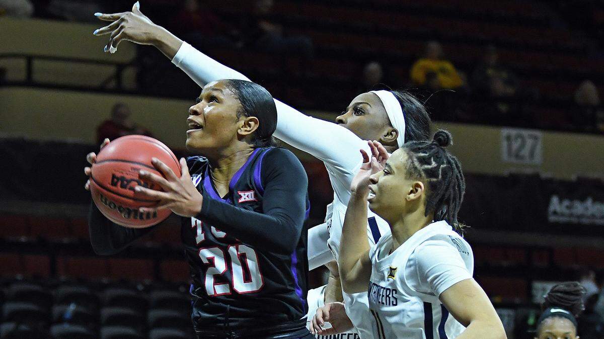 TCU’s Lauren Heard (20) ends her college career as the program’s all-time scoring leader.