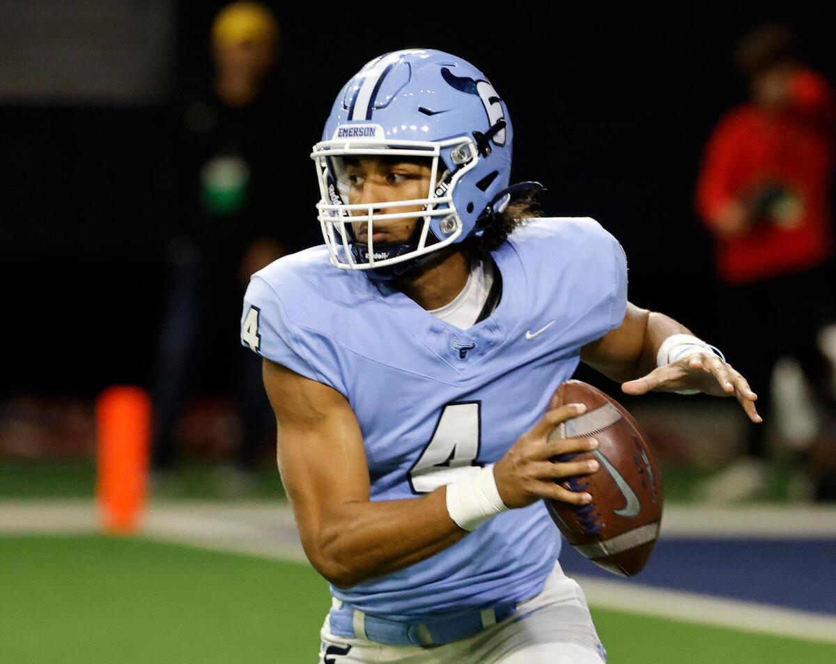 Emerson quarterback Michael Hawkins (4) turns on a keeper during the first half of a UIL Conference 5A Division 2 quarterfinal football playoff game at The Ford Center in Frisco, Texas, Friday, Dec. 01, 2023.