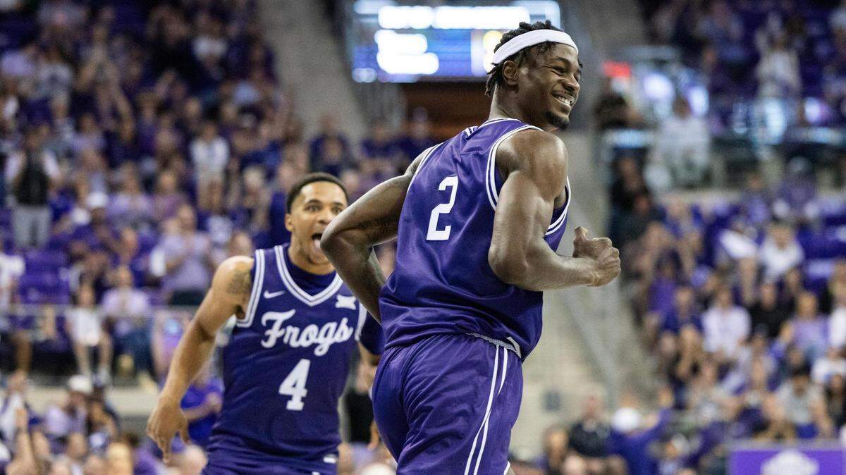 TCU forward Emanuel Miller (4) smiles after getting a put back layup during the second half of the Big XII match up between the TCU Horned Frogs and the Cincinnati Bearcats at Schollmaier Arena in Fort Worth on Saturday, Feb. 24, 2024.