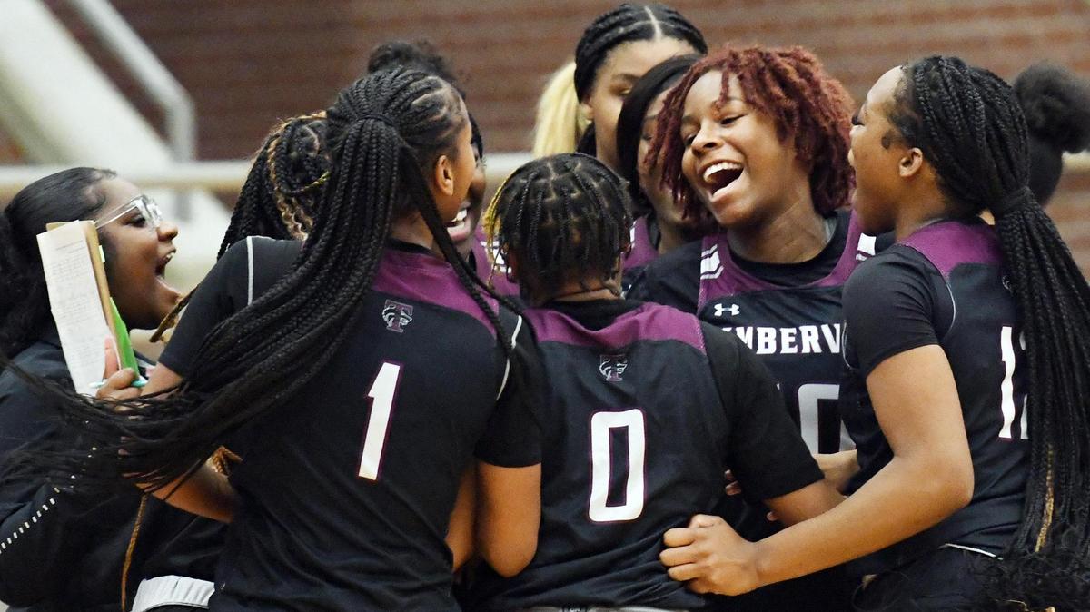 Mansfield Timberview team members celebrate their 44-34 win over Coppell in Friday’s December 30, 2022 girls Spring Creek Invintational final basketball game at Mansfield Summit High School in Mansfield, Texas. Special/Bob Haynes