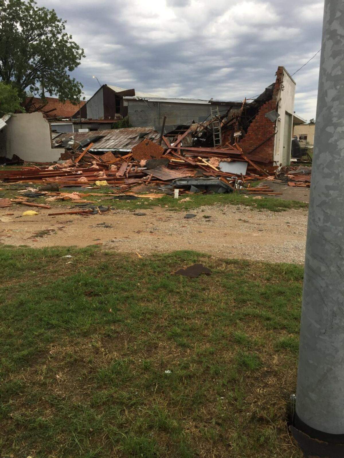 David Winn shared photos after a tornado destroyed his building in downtown Bowie on Friday.