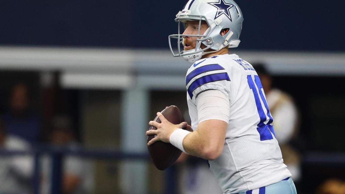 Dallas Cowboys Cooper Rush looks to pass during the game against Washington Commanders on Sunday, Oct. 2, 2022, at AT&T Stadium in Arlington.