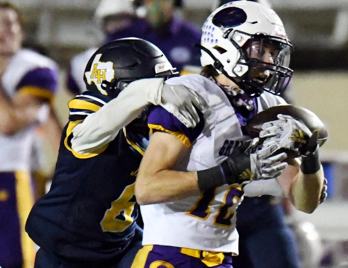 Arlington Heights’s Kendall Cook, left tries to stop Granbury’s Cordel Gibson as he takes a long catch into the endzone for a touchdown to take a 31-14 lead in the fourth quarter of their Division 1 District 3-5A football game Thursday, November19, 2020 at Farrington Field in Fort Worth, Texas. Granbury won 38-14. Special/Bob Haynes