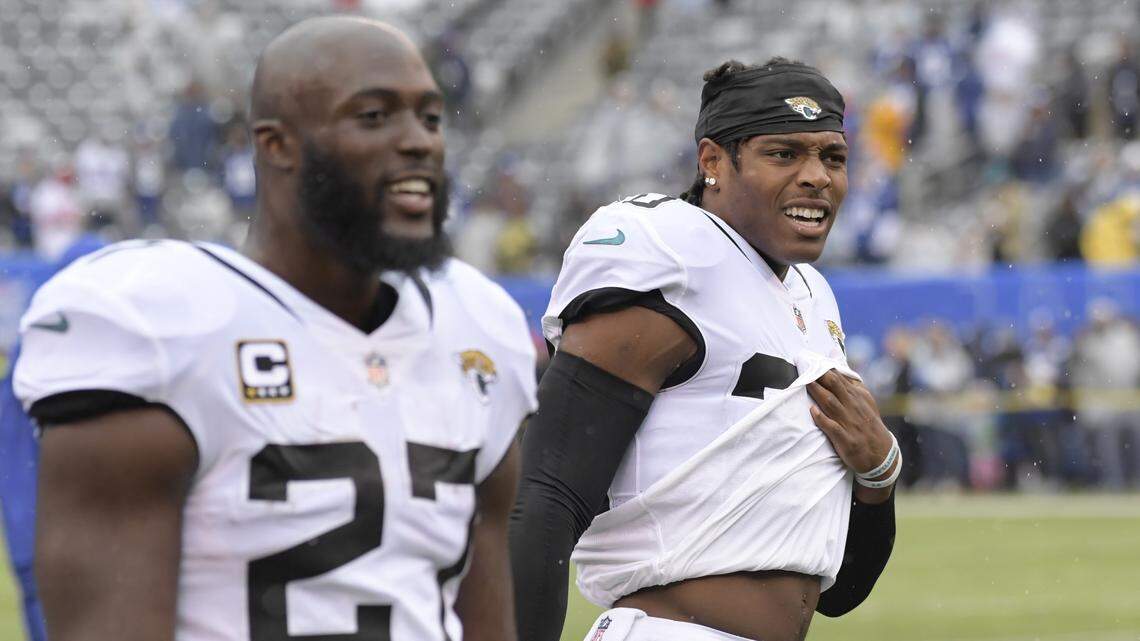 Jacksonville Jaguars cornerback Jalen Ramsey, right, and Leonard Fournette (27) talks to fans before of an NFL football game against the New York Giants Sunday, Sept. 9, 2018, in East Rutherford, N.J.