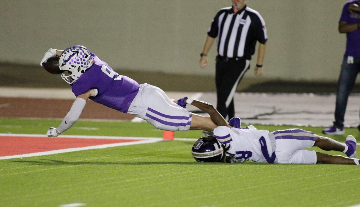 Pashal’s Luke Tevis drives into the end zone for a score during a UIL football game at Farrington Field Stadium on Thursday, October 4, 2024.