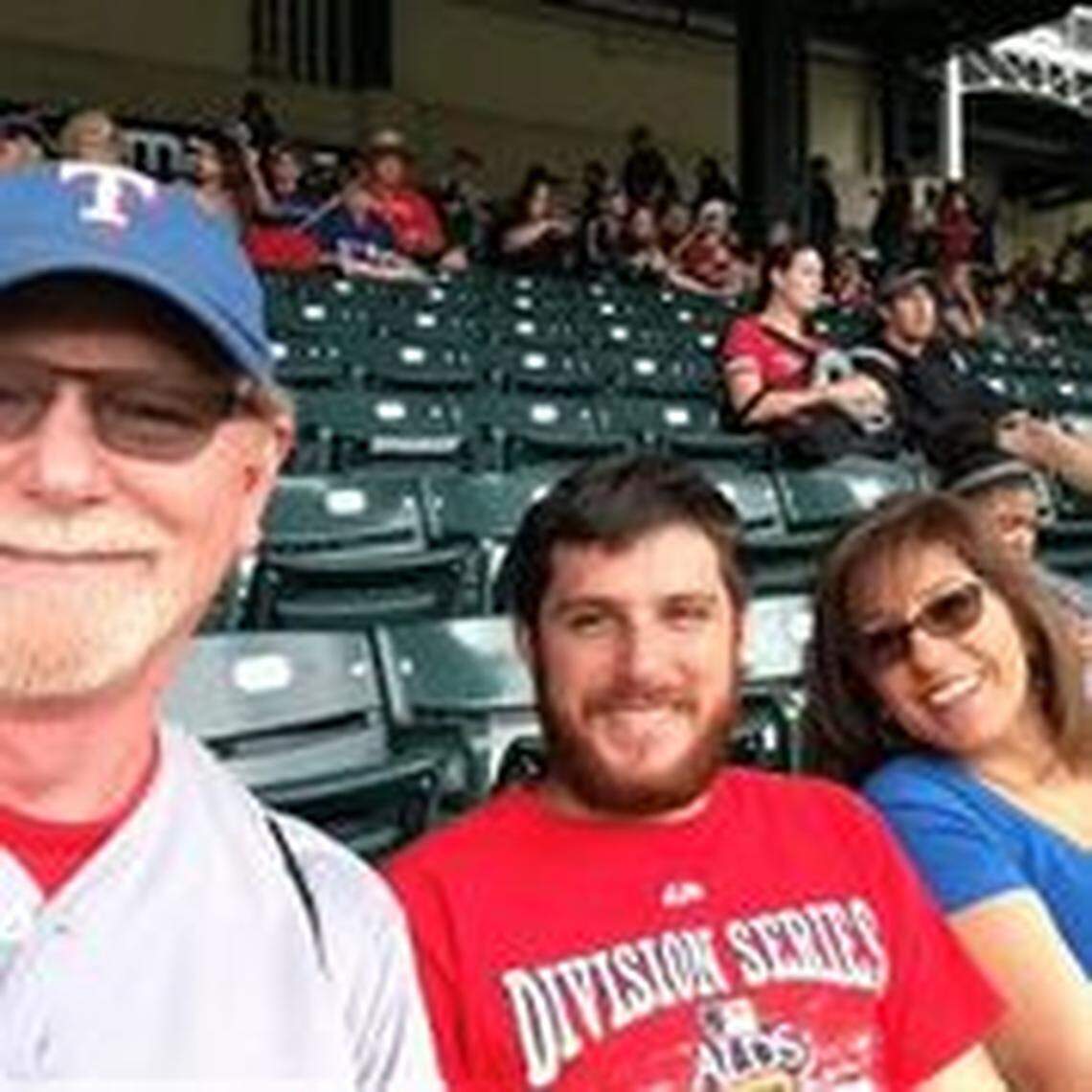Trevor Reed pictured with his father, Joey Reed, (left) at a Texas Rangers baseball game.