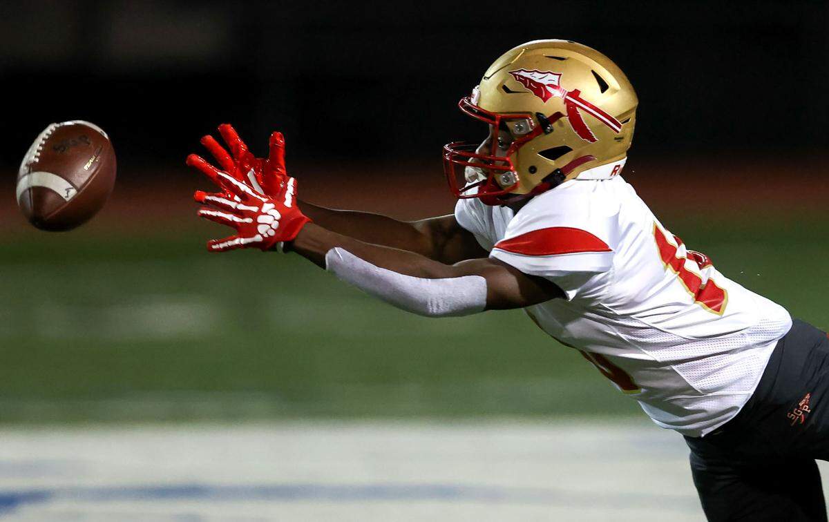 South Grand Prairie wide receiver Matthew Ramirez reaches out for a reception against Arlington Lamar during the first half in a District 8-6A high school football game played at Cravens Field on Thursday, November 4, 2021, in Arlington. (Steve Nurenberg/Special to the Star-Telegram)