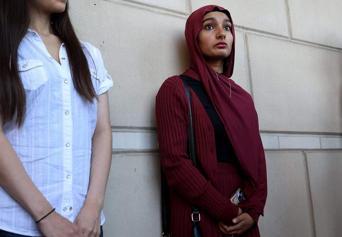 Afsheen Khan, right, attends a press conference held by supporters of her case on Monday, Sept. 8, 2025, outside the Tim Curry Criminal Justice Center in Fort Worth. Khan and two other pro-Palestine protesters initially faced misdemeanor graffiti charges but prosecutors upgraded their cases o third-degree felonies under Texas hate-crime law, with possible sentences of two to 10 years in prison for criminal mischief causing damage to a place of worship.