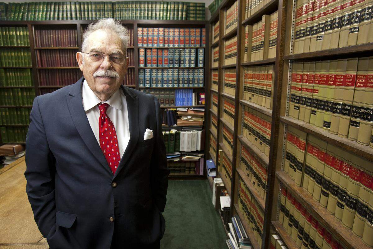 Grapevine Mayor William D. Tate poses in his library on January 9, 2015.