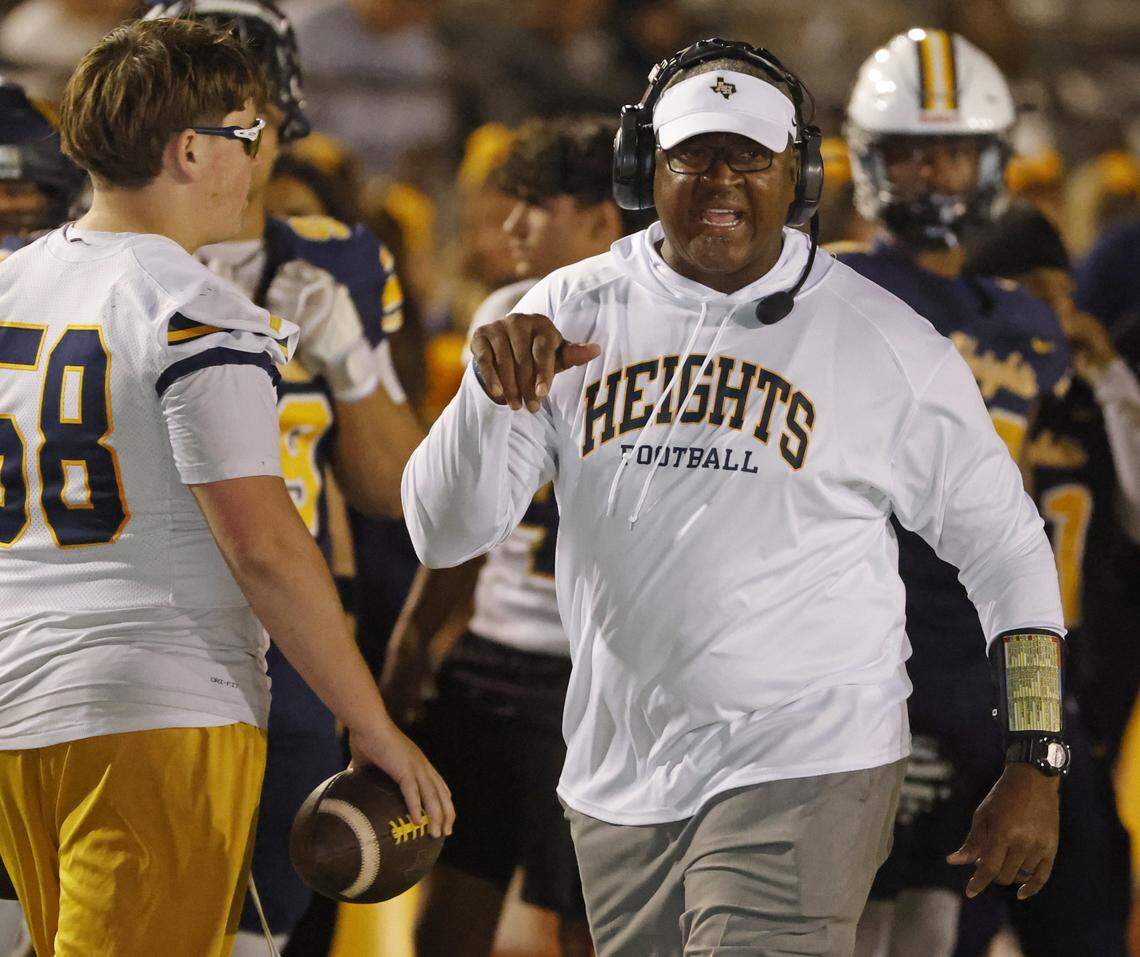 Arlington Heights head coach Curtis James is upset about a call as he walks the sidelines during the first half of a Class 5A Division I bi-district playoff game against Brewer on Friday at Farrington Field.