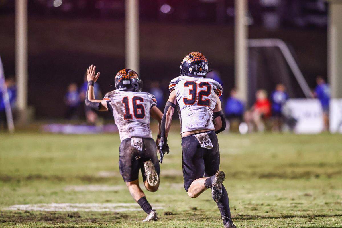 Springtown’s Darren Sweely (32) returns an interception the Friday, Nov. 1 game at Decatur. Special to the Star-Telegram / Tom Marvin