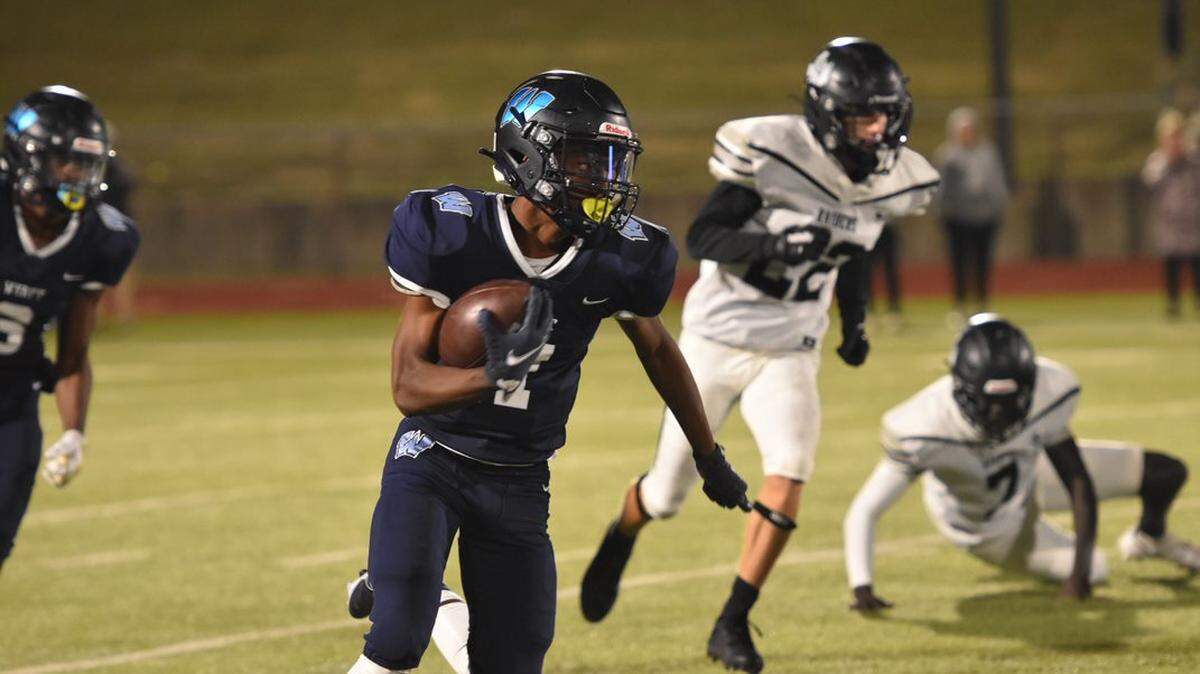 Jason Black (1) carries the ball for O.D. Wyatt during a high school playoff football game against Randall at Clark Stadium Thursday, November 11, 2021. Randall won 63-21. Photo by Nang Sang/Special to the Star-Telegram.