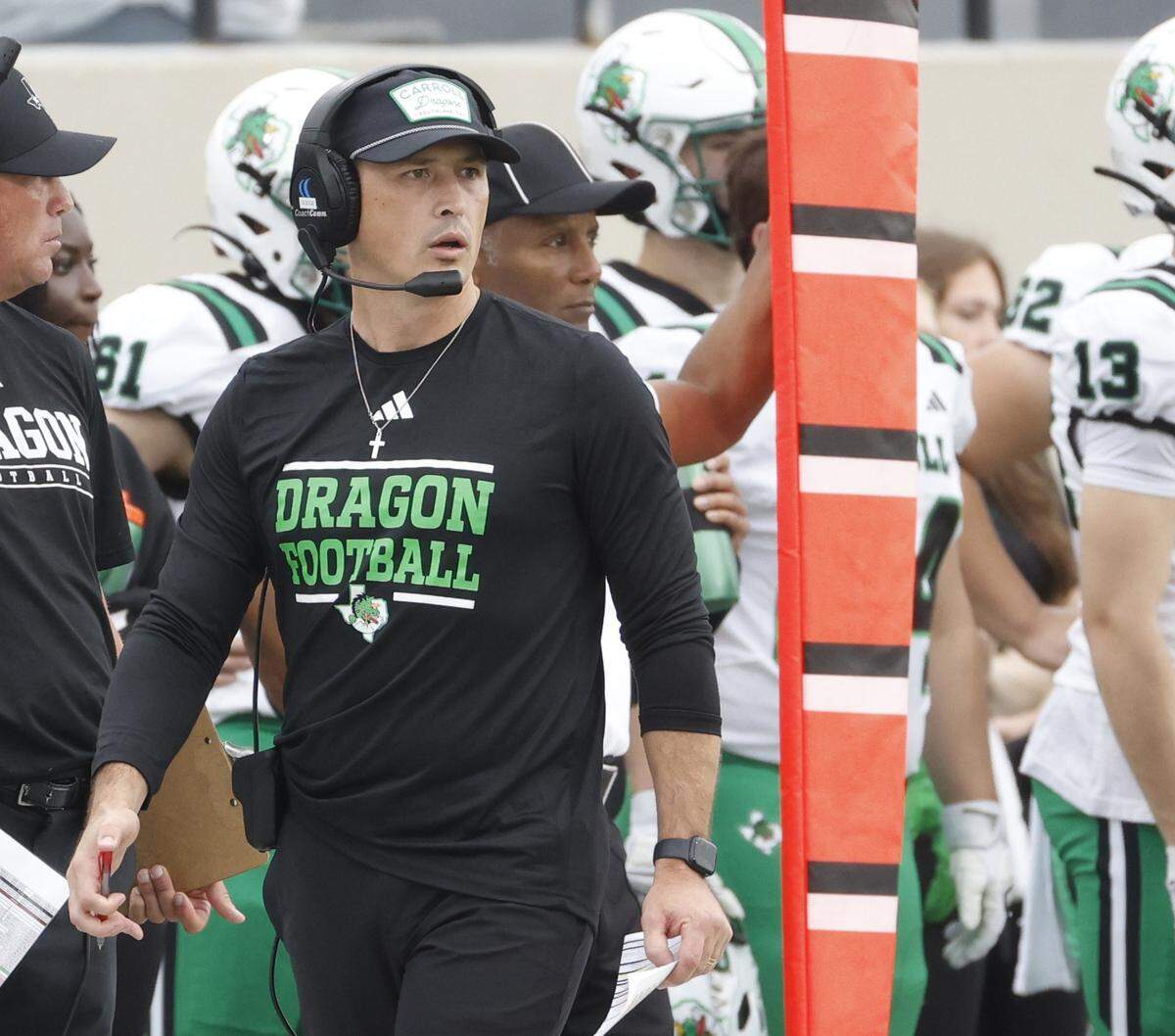 Southlake head coach Riley Dodge watches his defense during the first half of a UIL football game between Carroll and L.D. Bell at Pennington Field in Bedford, Texas, Friday, October, 24, 2025.
