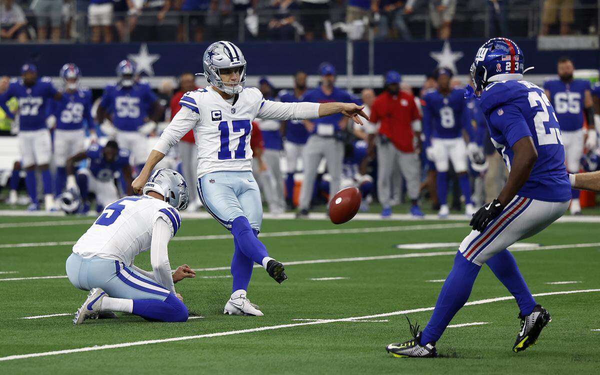 Dallas Cowboys kicker Brandon Aubrey boots the game-winning field goal in overtime against the New York Giants on Sunday at AT&T Stadium.