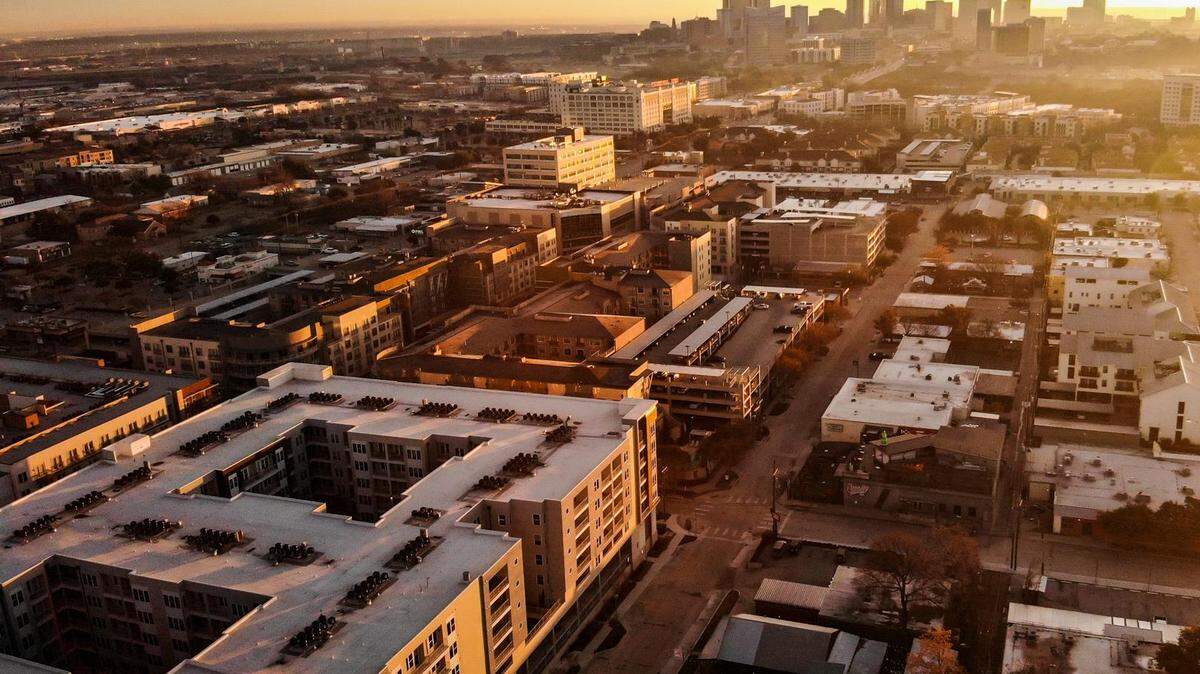 The sun sets on Crockett Row in the West 7th neighborhood of Fort Worth.