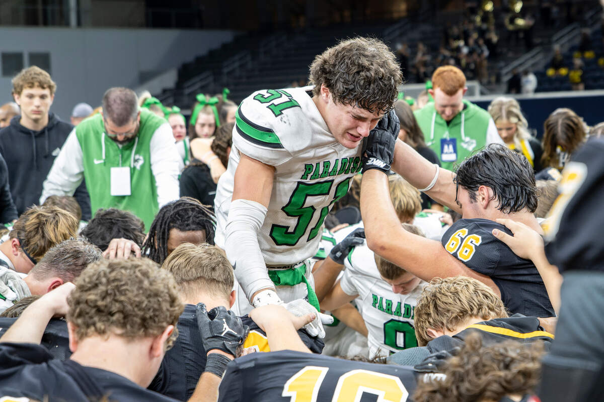 Paradise linebacker Blake Read leads a post-game prayer at midfield with players from both Malakoff and Paradise following their Class 3A Division 1 state quarterfinal on Thursday, Dec. 12, 2024 at the Ford Center in Frisco, Texas.
