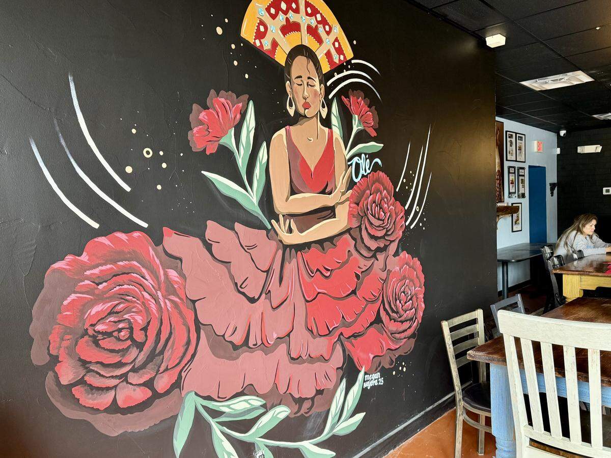 A mural by Megan Najera of on the dining room wall at Enchiladas ¡Olé! on West Magnolia Avenue, as seen Dec. 16, 2025.