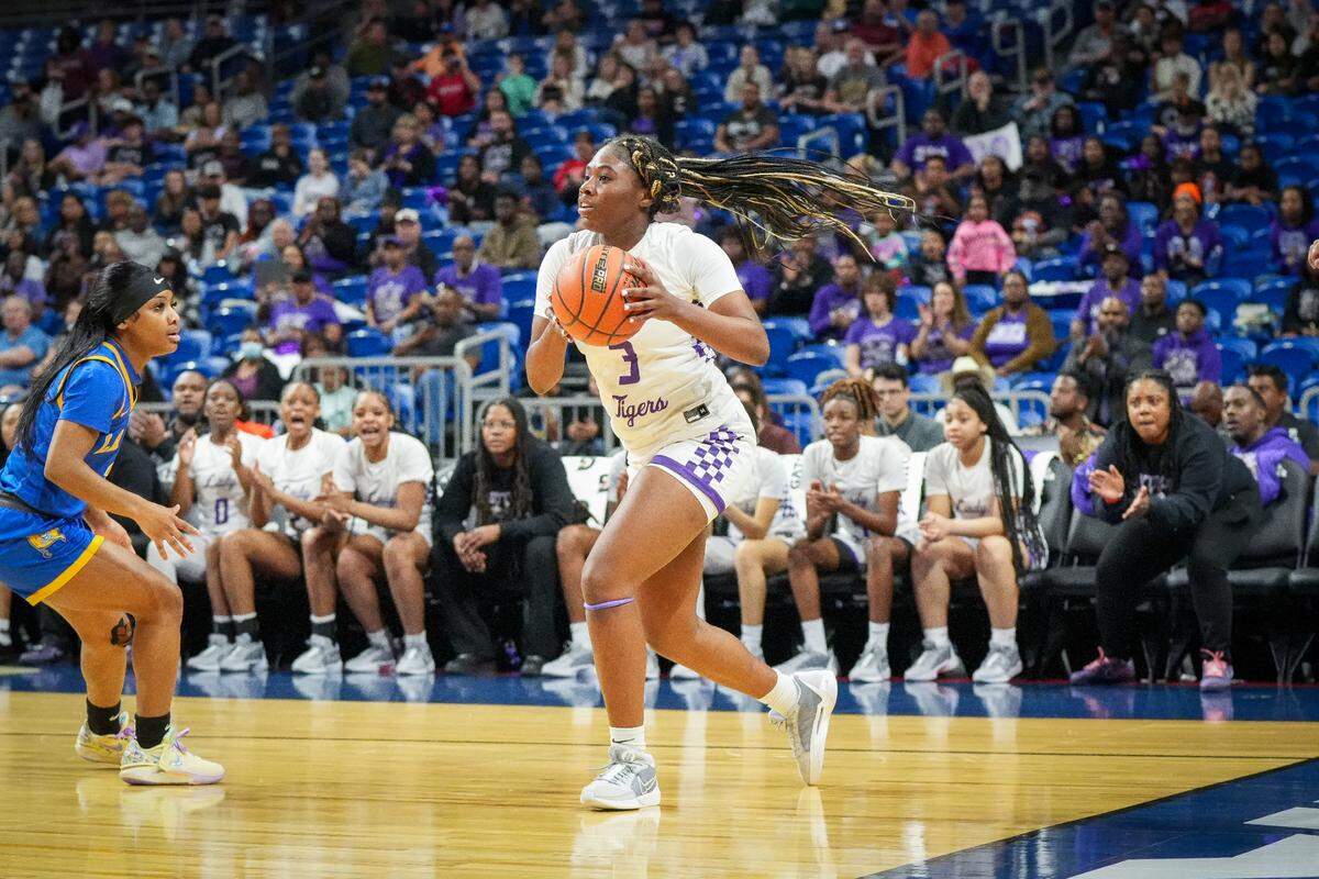 Dallas Lincoln’s Grace Spencer looks to drive the baseline against Waco La Vega in a Class 4A state semifinal on Friday, March 1, 2024 at the Alamodome in San Antonio, Texas. La Vega won 65-60 in double overtime.