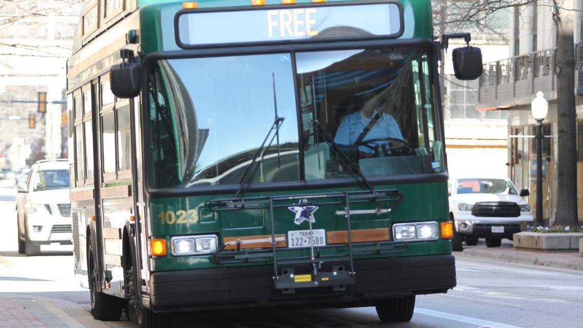 Molly the Trolley rolls down Houston Street on Friday morning, advertising its newly restored "free" status.